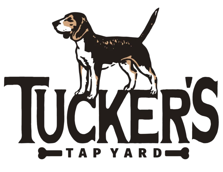 Dog park training practice with a dog holding a calm sit before entering a Winston-Salem dog park